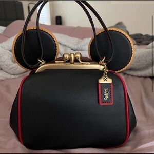 Coach Disney Black and Gold Mini Bag with Red Trim